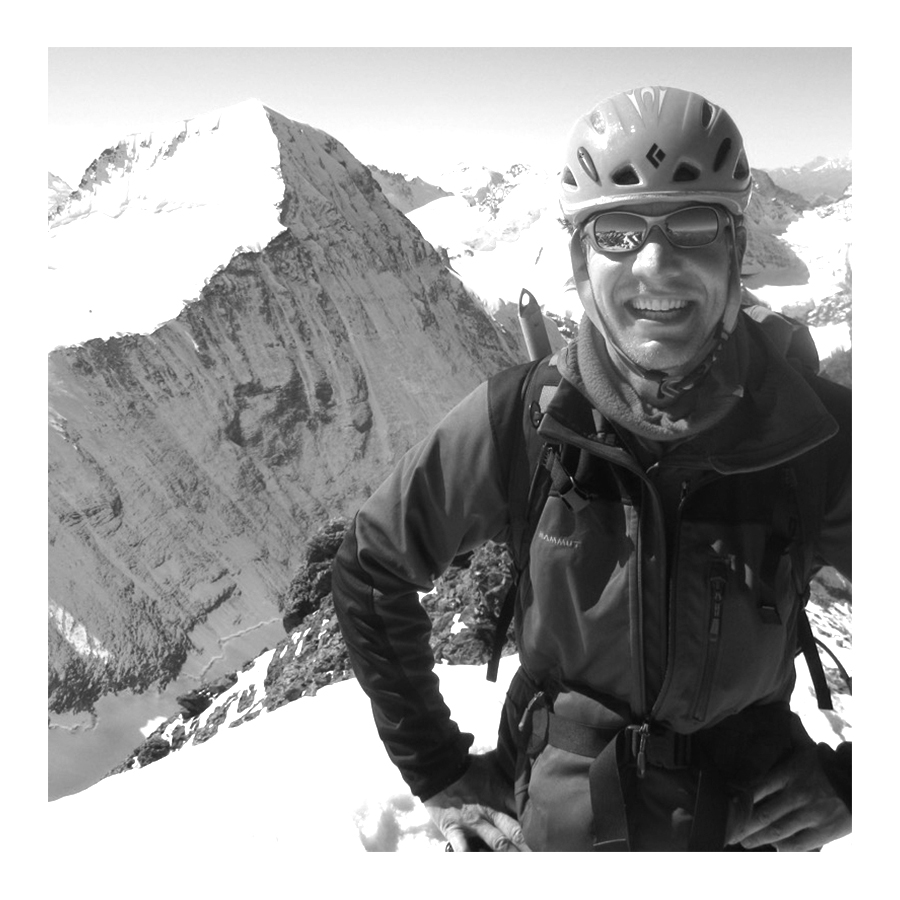 Original photograph of climber reaching the summit of the Eiger